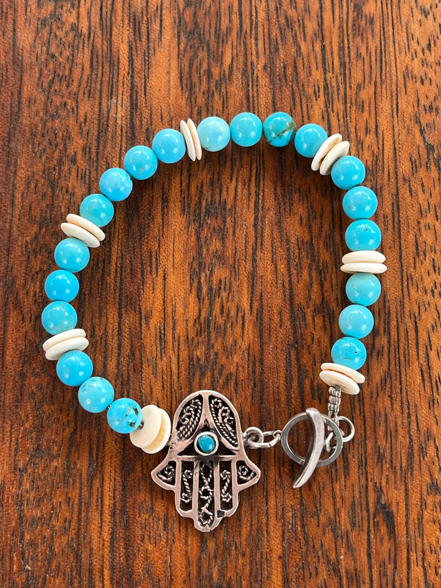 اسورة تراثية فضة وعاج وفيروز